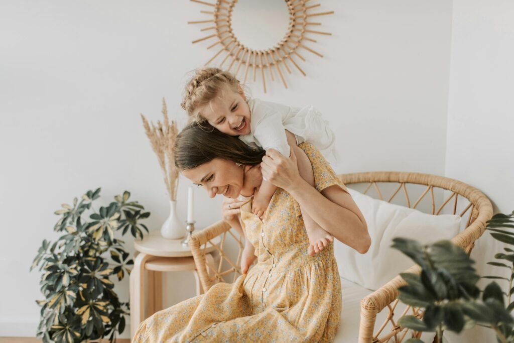 Happy mother and daughter bonding at home, showcasing love and togetherness.